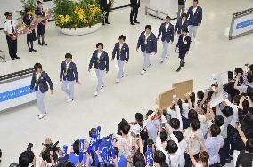 Japan's judo team returns home