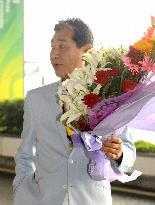 Japan's Olympic baseball manager Hoshino arrives in Beijing