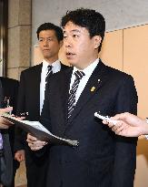 Okinawa minister refuses to call riot cop's slur discriminatory