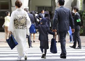 Public school pupil in Armani uniform