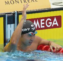Kitajima rewrites national mark in 50 breaststroke semi