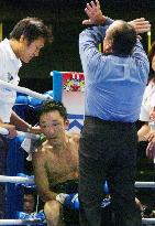 WBA undefeated champ John too much for Takemoto