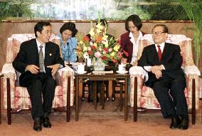 Jiang, Kan agree to work for 'common understanding'