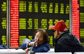 Shanghai stocks fall sharply following G-20 meeting