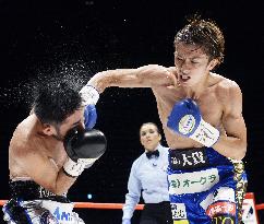 Taguchi defends championship in WBA title match