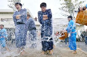 Grooms soaked with water in ancient Japanese marital tradition