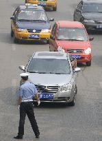 Beijing car ban begins in bid to improve air quality