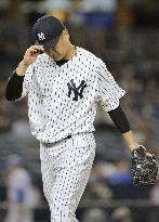 Tanaka roughed up, but Yankees outslug Royals