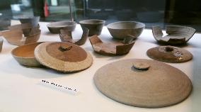 Unglazed pottery found at archeological site in ancient town