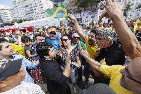 Protesters rally in Rio against Rousseff