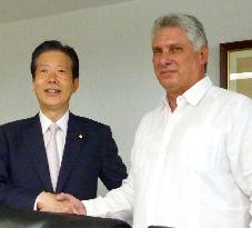 Head of Japan's junior ruling coalition party meets Cuban vice pres.