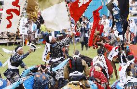 Armored warriors compete in horse race