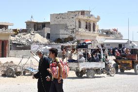 Refugees return to western Mosul