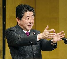 Abe talks ties with China