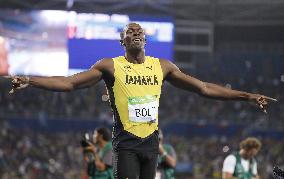 Olympics: Bolt completes 3rd sprint double with 200 win