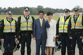 Japan PM Abe flies to Indonesia from Australia
