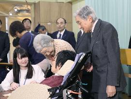 Emperor and empress visit facility for disabled