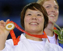 Japan's Tanimoto strikes gold to defend judo crown in Beijing