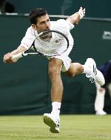 Djokovic moves into Wimbledon 3rd round