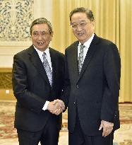China's No. 4 leader meets ex-Japan lower house speaker
