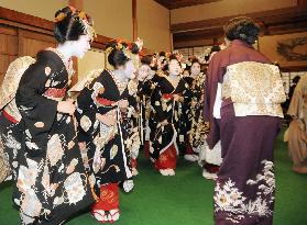 Geisha in Kyoto mark first business day of year