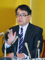 BOJ policymaker warns current monetary policy may hurt economy