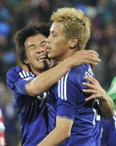 Japan overpower Denmark to cruise into last 16