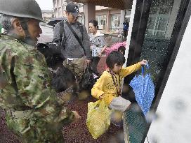 Heavy rainfall adds to problems in quake-stricken southwestern Japan