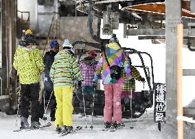 Skiers at Kusatsu ski resort after eruption