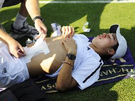 Nishikori retires from Wimbledon 1st round with abdominal injury