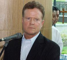 Webb gets release of U.S. man held for breaking Suu Kyi house arr