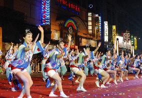 Japanese dancers perform in the streets of downtown Beijing