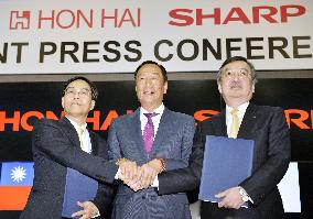 Hon Hai, Sharp sign takeover deal after month-long review