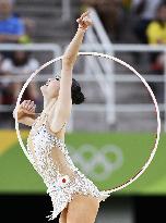 Japan rhythmic gymnast Minagawa performs with hoop