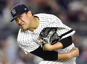 Baseball: Tanaka earns 12th win as Yankees beat Orioles