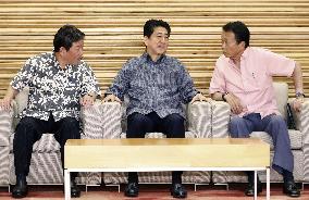 Japanese ministers in Okinawa shirts