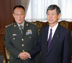 Japan, China hold defense minister talks in Tokyo