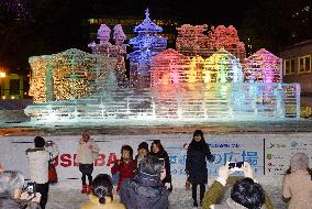 CORRECTED: Snow statues lit up prior to start of Sapporo Snow Festival