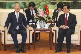 Hu Jintao meets with ex-Japanese Prime Minister Nakasone