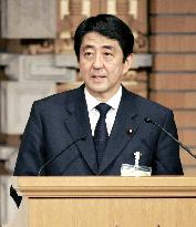 Abe unveils climate change initiative to halve emissions by 2050