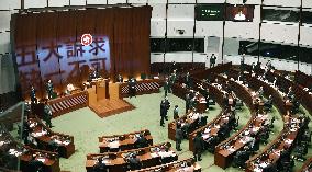Hong Kong lawmakers protest