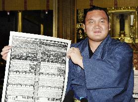 Yokuzuna Hakuho with banzuke rankings