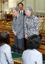 Emperor and empress at music event