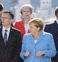 British PM May, German Chancellor Merkel