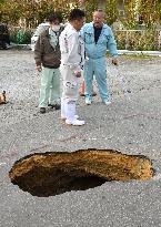 Sinkhole appears on Okinawa road