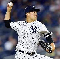 Baseball: Tanaka earns 12th win as Yankees beat Orioles