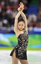 Kim Yu Na tops short program