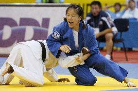 Tani wins gold in 48 kg weight class