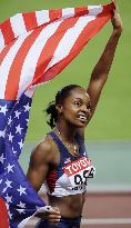 Michele Perry captures women's 100 meters hurdles