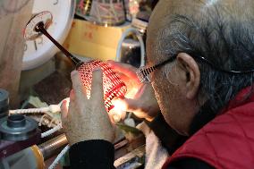 Japan's cut glass master carries on tradition, answering modern needs